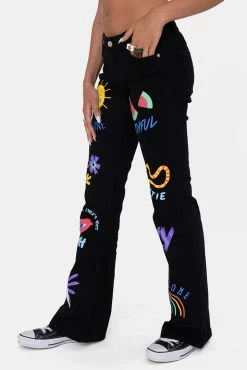 Adika JOYFUL Low-Rise Graphic Jeans | FLARE