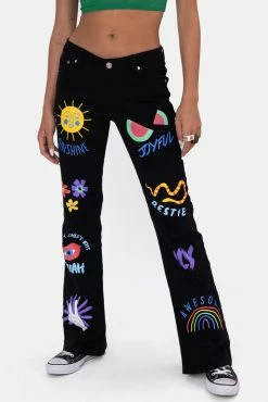 Adika JOYFUL Low-Rise Graphic Jeans | FLARE